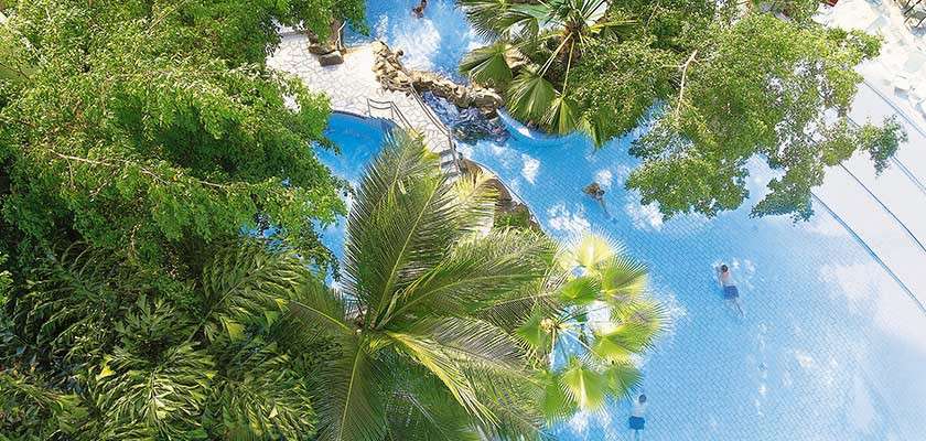 A family on an electric boat.