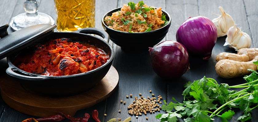 Plates of food and the ingredients used to cook them