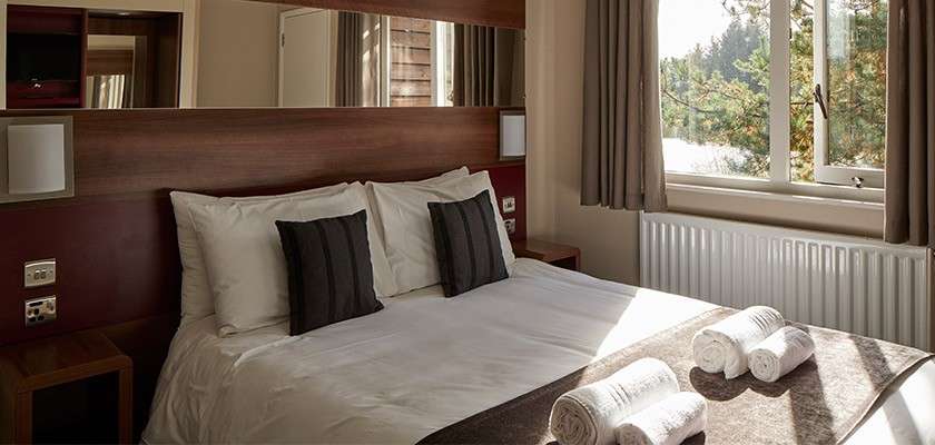 Double bed inside a Center Parcs lodge