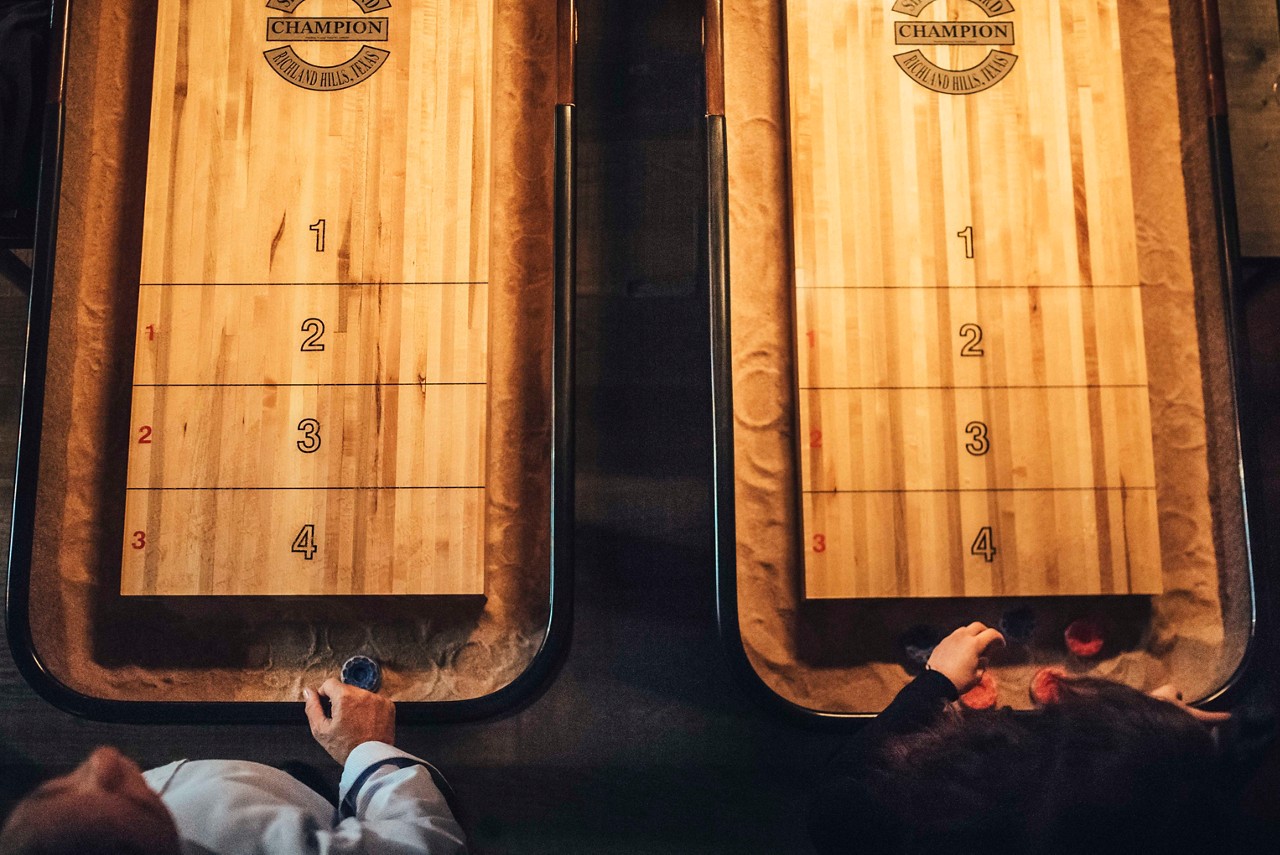 Aerial image of two Interactive Shuffleboard tables.