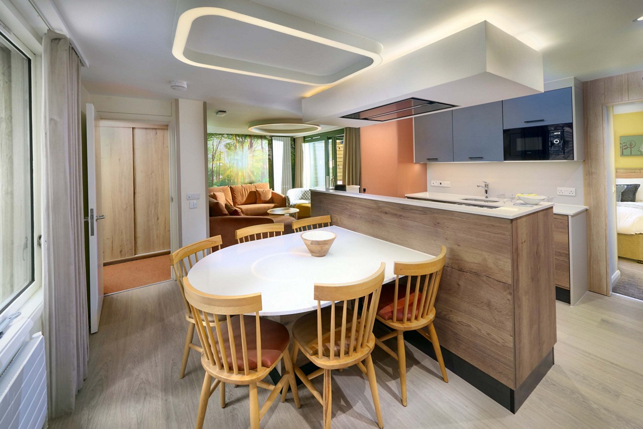 Grand Forest Lodge in the woods.